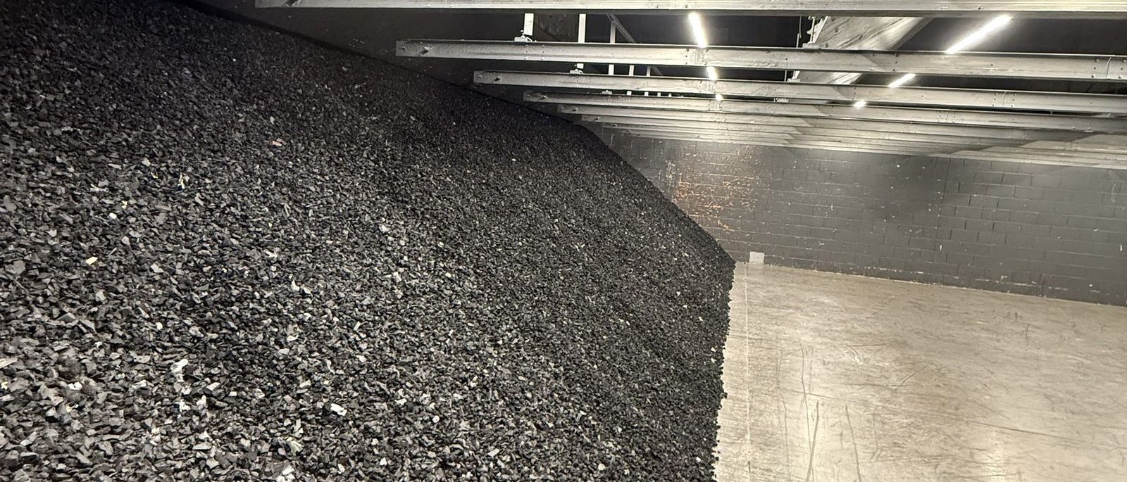 The same berm from down-range: media banked left, floor swept clean to the right